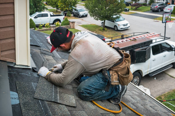 Professional Roofing technician working in Liberty, NY